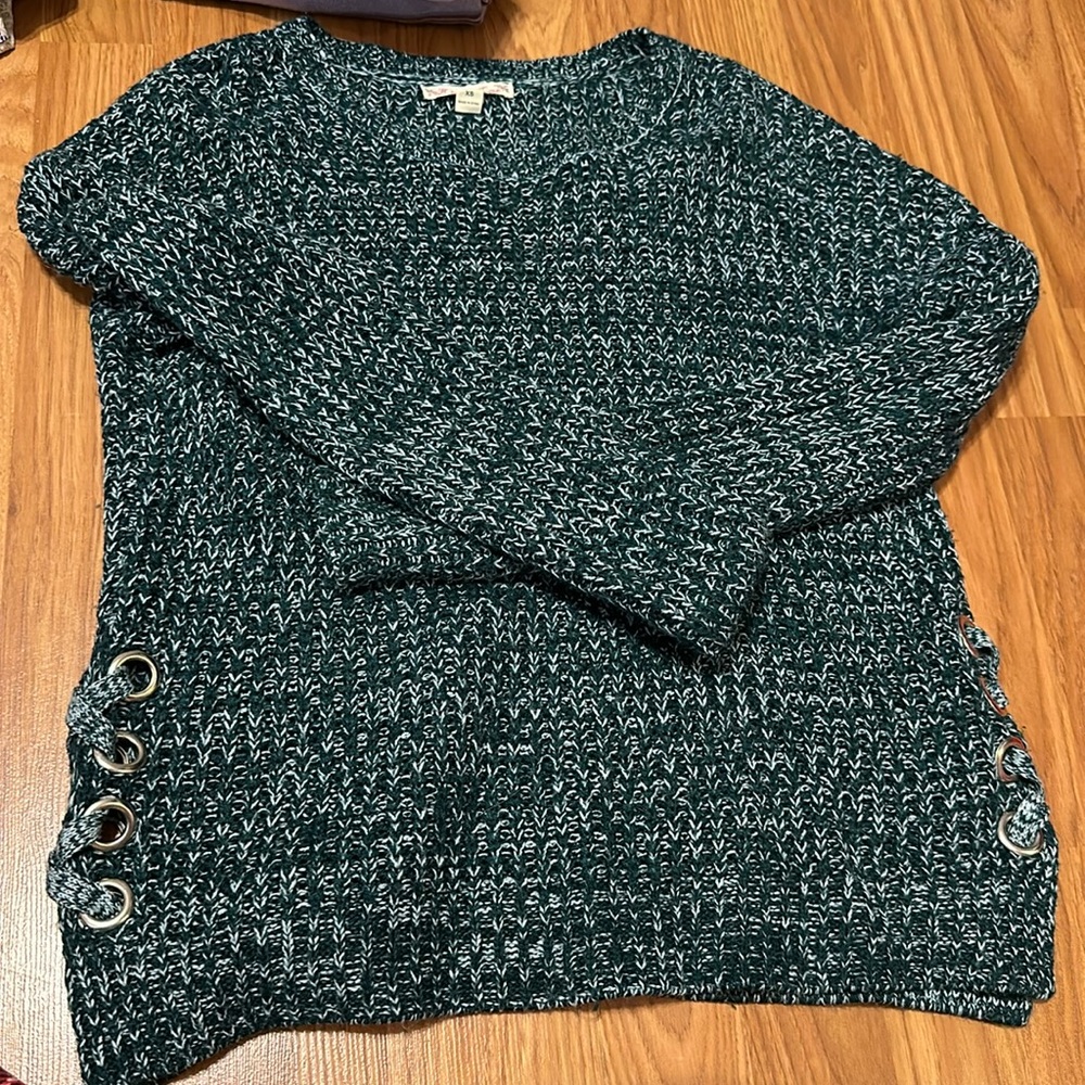green sweater